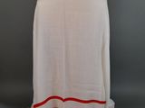 an image of a white and red shawl on a mannequin mannequin