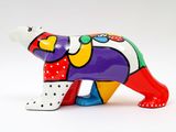 brightly colored bear figurine on white background with white background