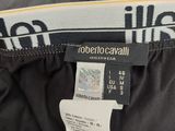 the label on the back of a black jacket that says roberto cavalli