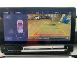 a picture of a car ' s rear view camera in the passenger seat