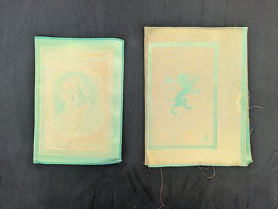 pair of two old book covers with a picture of a man and a woman