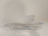 a plastic bag sitting on top of a white table