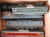 three trains in a box on top of each other
