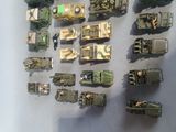 a lot of military vehicles that are on the table