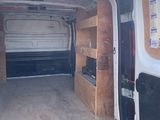 a white van that is parked in a lot