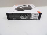 the box of the headphones is open on a white surface