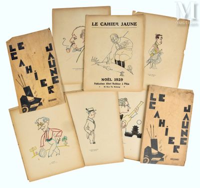 six livres illustrés de personnages, posés sur une table