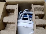 a cardboard box with a computer mouse inside of it