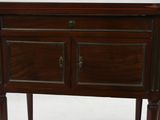 a small table with a drawer on top of it