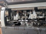 an image of a machine that is working on a piece of machinery