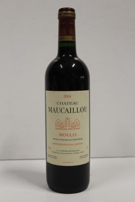 a bottle of wine that is sitting on a table