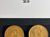 two gold sovereigns, one of which is a sovereign and the other of which is a sovereign