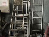 a ladder that is leaning against a wall in a garage