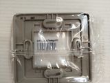 a plastic box with a label on it on a table