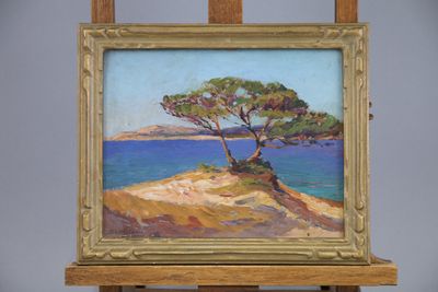an oil painting of a tree sitting on top of a wooden easel