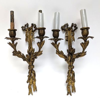 pair of antique brass wall sconces with flowers and leaves