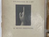 an old book with a picture of a hand on it