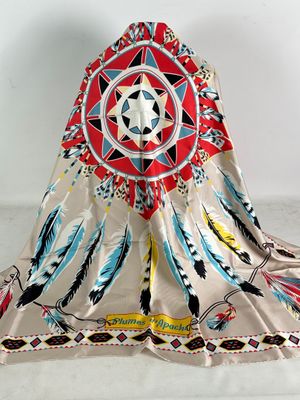 an image of a blanket with a native design on it