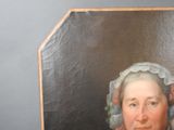 portrait of a woman in a bonnet with a blue dress and a white bonnet