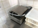 an image of a commercial grill in a commercial kitchen