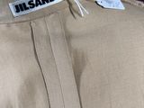 a close up of a person ' s shirt with a name tag on it
