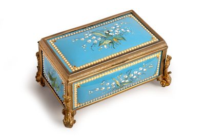 une boîte bleue et dorée ornée de fleurs