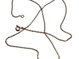 a close up of a chain with a clasp on a white background