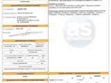 un gros plan d'un document sur lequel figure la photo d'une personne