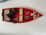 a small boat that is sitting on top of a table