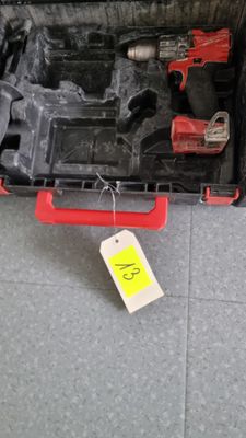 a tool case with tools inside of it on the floor