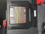 a battery charger that is connected to a car charger