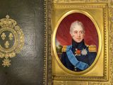 portrait of a man in a military uniform in a gold case