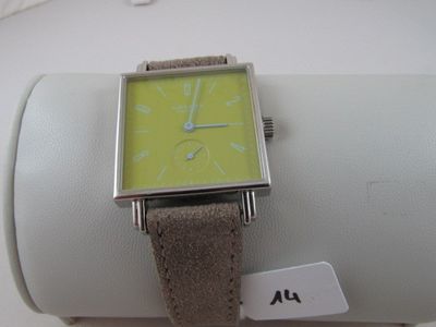 a watch that is sitting on top of a display case