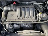 the engine of a car with its hood open and the hood down