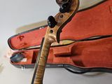 a violin that is sitting in a case