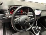 the interior of a car with a steering wheel, dashboard, and dash board