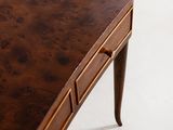 a wooden table with a drawer on top of it