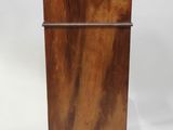 an image of a small wooden cabinet with a drawer on top of it