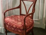 a chair that is sitting in the corner of a room