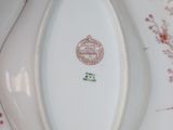 a white plate with a floral design on it