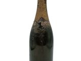 an old bottle of champagne on a white background with a white background