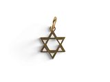 a gold star of david charm on a white background