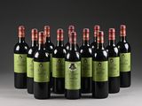 six bottles of red wine are lined up in a row