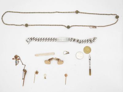 an assortment of jewelry including a necklace, bracelet, and other items