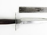 two knives that are sitting next to each other on a table