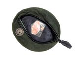 a green beret hat with a badge on it