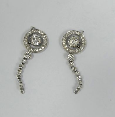 pair of diamond earrings on a white background
