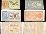 six billets de banque différents, de couleurs et de motifs variés, sur fond noir