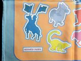 a handkerchief with a picture of cats and dogs on it