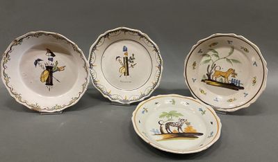 three plates with different designs on them sitting on a table